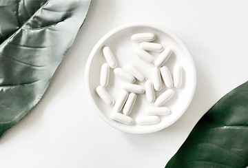 a bowl of white pills