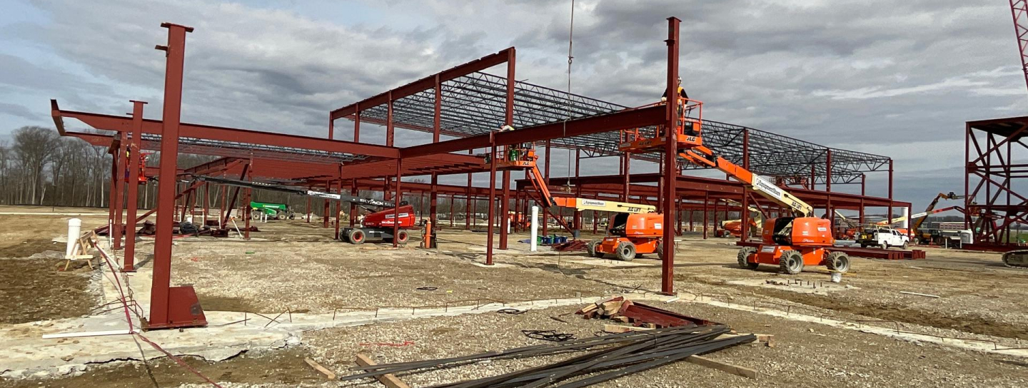 a construction site with several workers