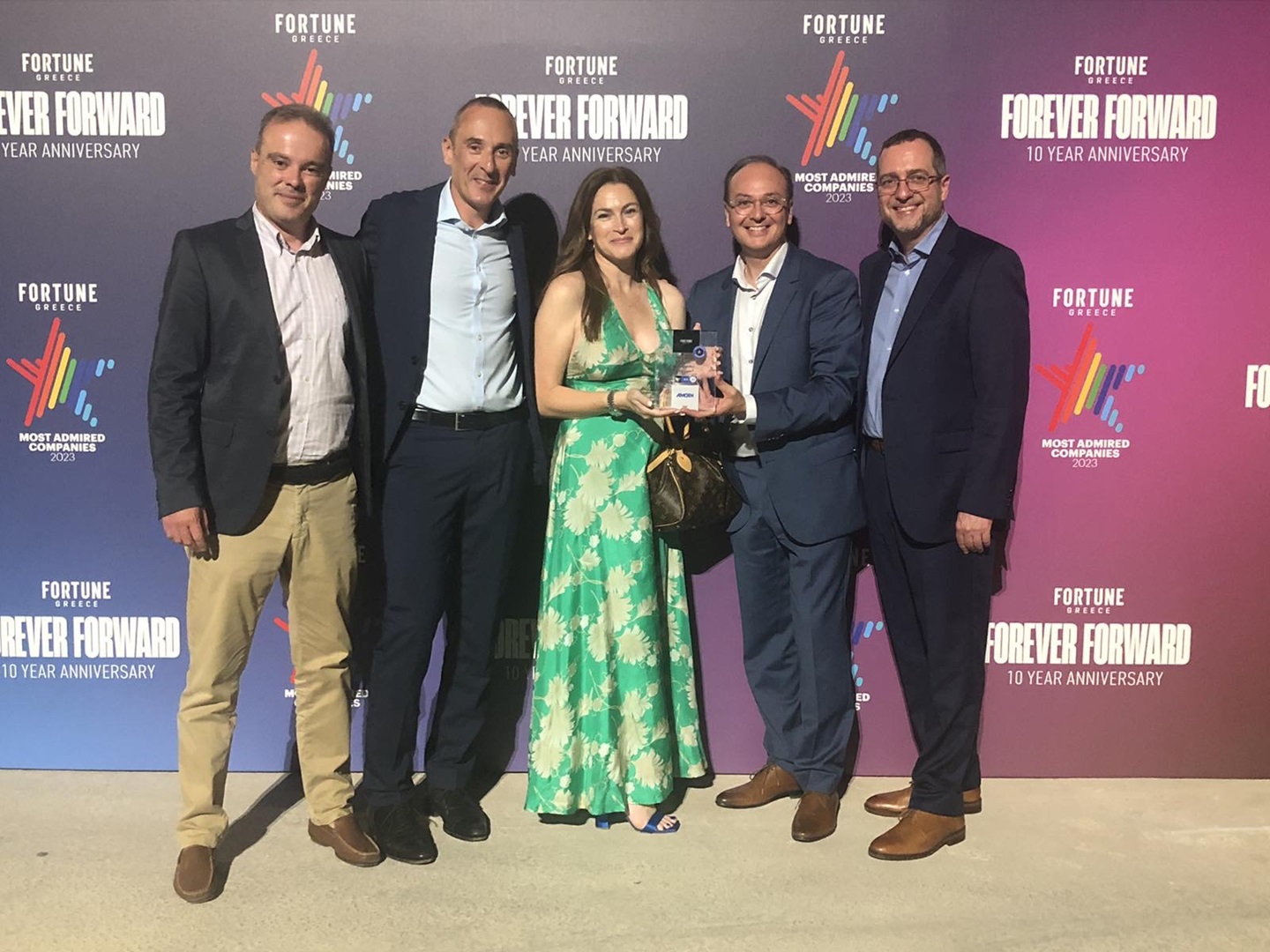 a group of people posing for a photo