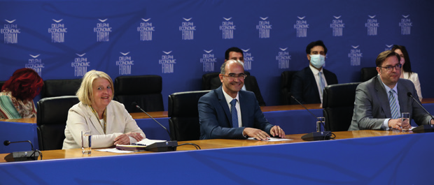 A group of people sitting at a table