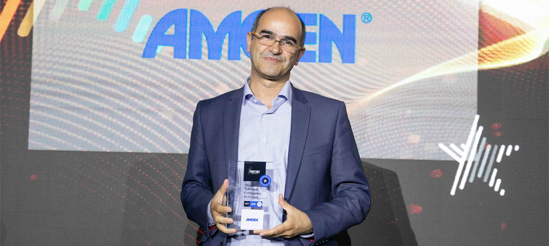 a person holding an award